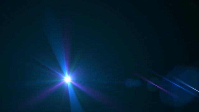 Lens Flare Light Over Black Background. Easy To Add Overlay Or Screen Filter Over Video.Abstract Blue Laser Streak Light On Black Background.

