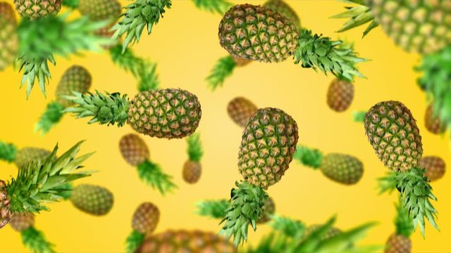 Pineapples falling down on yellow background. 4k video.