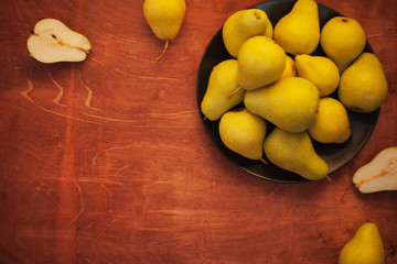 Pears on wooden table