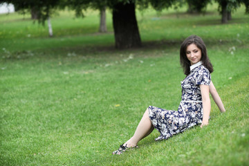 Beautiful girl in dresses for a walk