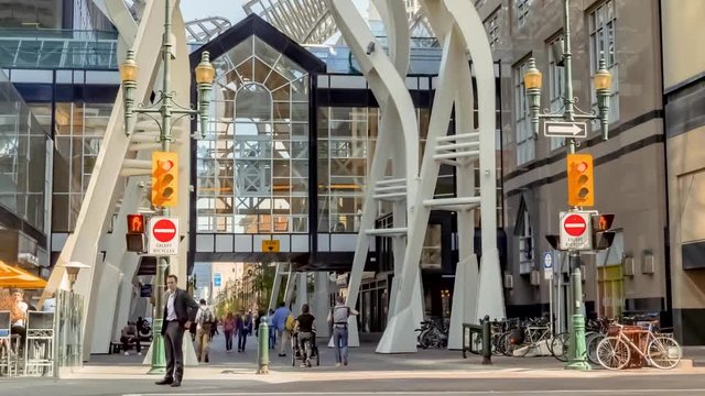 A normal speed timelapse of downtown calgary on a busy summer work day
