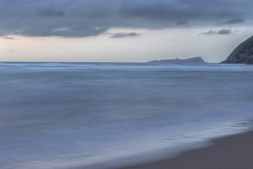 Long exposure photography of the Cantabrian sea and the Izaro island