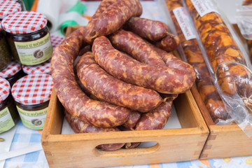 Homemade sausages for sale at local street market.
