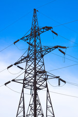 silhouette electricity pylons and power lines