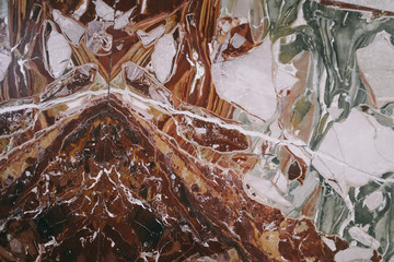 Natural Red and Green Marble Stone Surface Texture. Mixed Colors Abstract Background.