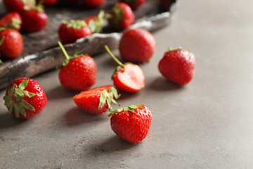 Sweet ripe strawberries on table