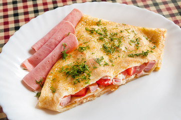 hot pancake with ham cheese and tomatoes