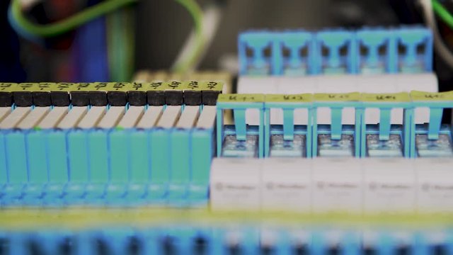 4K slider shot of wires of an programmable logic controller