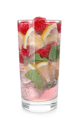 Glass of fresh raspberry mojito on white background
