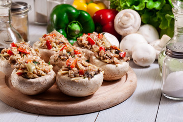Champignon caps stuffed with minced meat