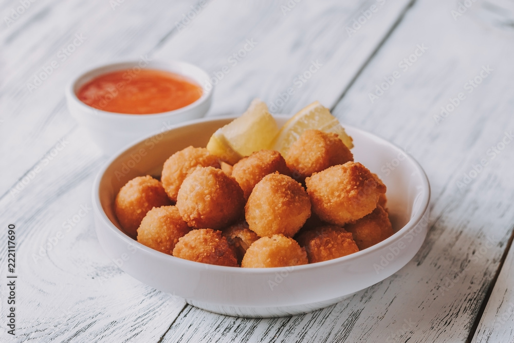 Poster bowl of scallop croquettes