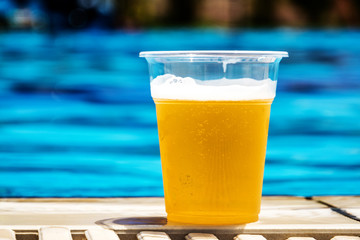 Swimming pool and beer