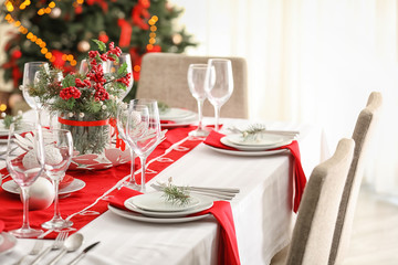 Table served for Christmas dinner in living room