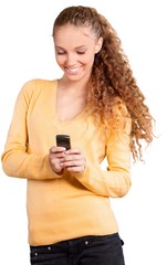 Fototapeta premium Beautiful young woman texting
