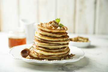 Pancakes with honey and nuts