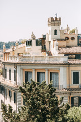 Obraz premium The architecture of Rome and the Italian style in stucco. Sights of the old town, tourist places. Street art, world heritage. Miracle of light. Carved columns and capitals