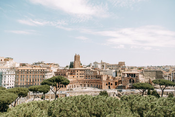 Obraz premium The architecture of Rome and the Italian style in stucco. Sights of the old town, tourist places. Street art, world heritage. Miracle of light. Carved columns and capitals