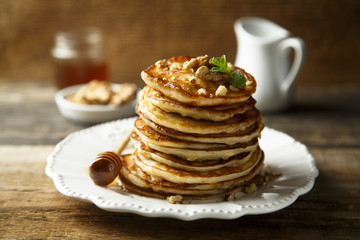 Pancakes with honey and nuts