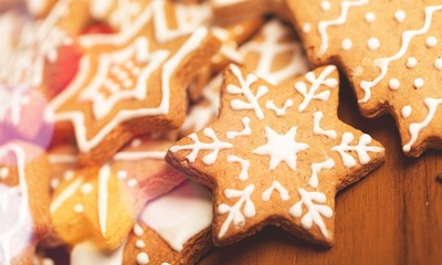 Tasty Christmas cookies  on background