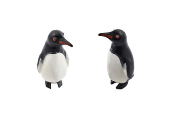 Vintage penguin toy stock photo images. Couple of penguins isolated on a white background. Penguin figurine retro toy stock photo images