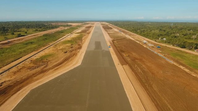 aerial footage construction new airport terminal on Panglao Philippines. Construction of a landing strip. Landing strip.
