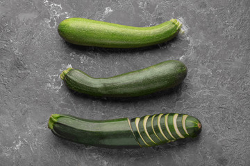 Ripe zucchinis on grunge table