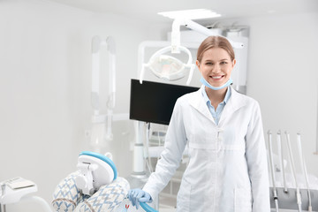 Young female dentist in clinic