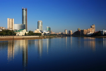 Fototapeta na wymiar Buildings of Yekaterinburg on the river bank