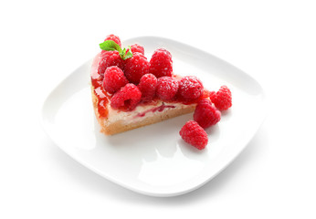 Plate with piece of delicious raspberry cheesecake on white background
