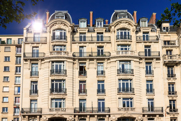 Typical architecture facade of an apartment building in Paris, France
