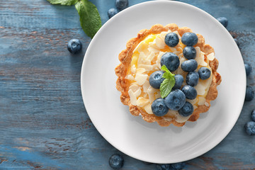 Delicious blueberry tart on plate