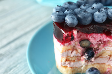 Delicious blueberry dessert on plate, closeup