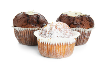 Sweet tasty muffins on white background
