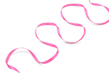 Fototapeta premium Curled pink ribbon on white background