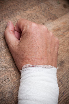 closeup of wrist sprain on wooden table