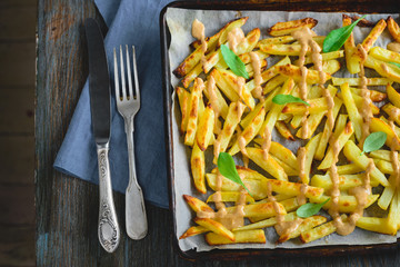 Baked potatoes with peanut sauce