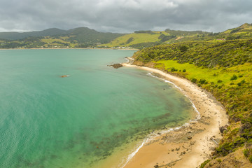 Pacific ocean coast near Omapere, New Zealand