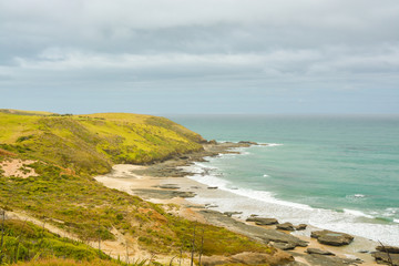 Naklejka premium Pacific ocean coast near Omapere, New Zealand