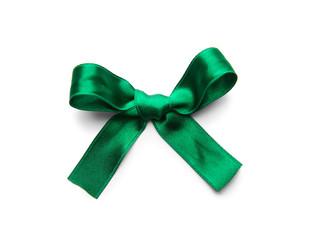 Beautiful bow made from green ribbon on white background