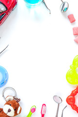 prevention and care children's teeth white background top view