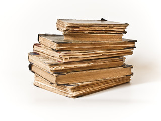 Vintage books stack isolated on white background.