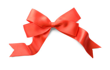 Beautiful bow made from red ribbon on white background