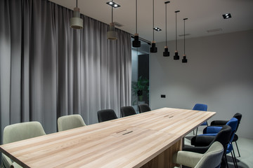 Stylish conference room with gray and blue walls
