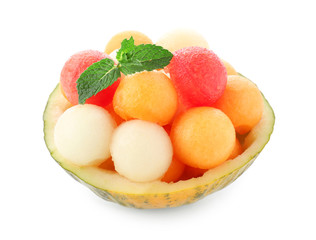 Bowl with fresh melon and watermelon balls on white background