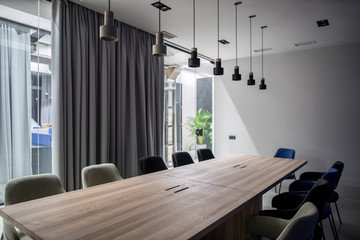 Stylish conference room with gray and glass walls