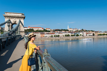 Female enjoying Budapest view from the bridge