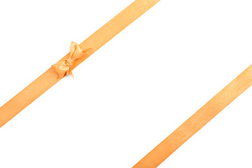 Golden ribbons with beautiful bow on white background