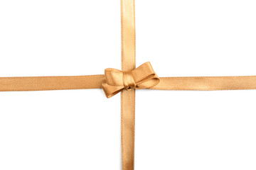 Golden ribbons with beautiful bow on white background