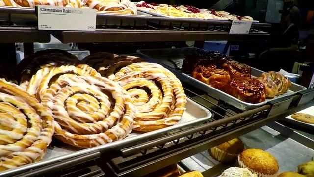 Shelves full of dessert pastries at Panera Bread.