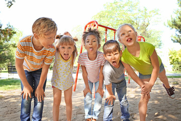 Portrait of funny little children outdoors